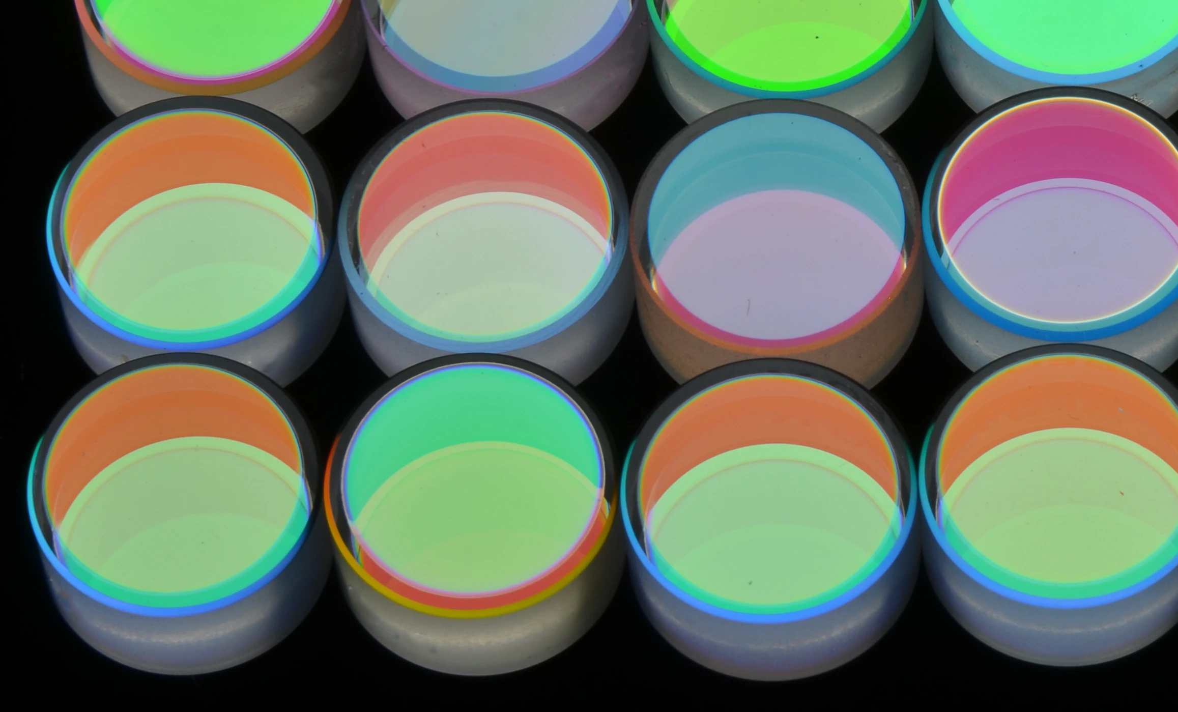 Grid of precision optical lenses manufactured by FiveNine Optics